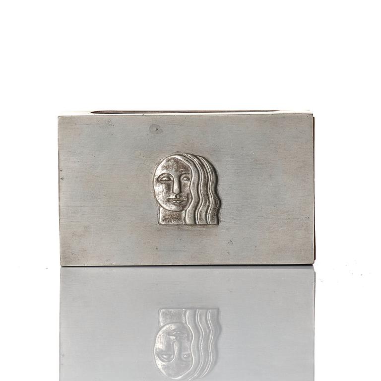 Firma Svenskt Tenn, a pewter matchbox case with beaker, models "38d" and "185a", with decor by Anna Petrus, Stockholm 1927-28.