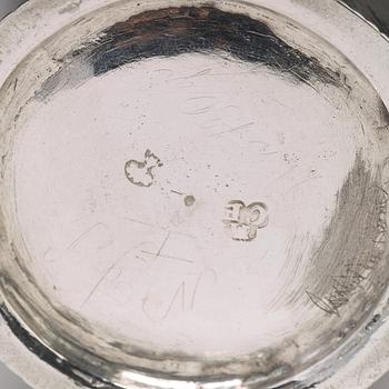 A Swedish 18th century parcel-gilt silver beaker with copper coins, mark of CM Ekman, Eksjö (1729-1738).