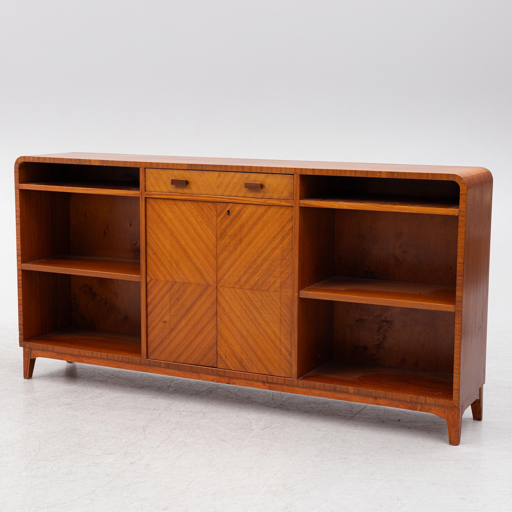 A ahogany-veneered 1940's/50's bookcase.