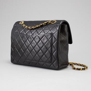 A "Double Flap bag" by Chanel.