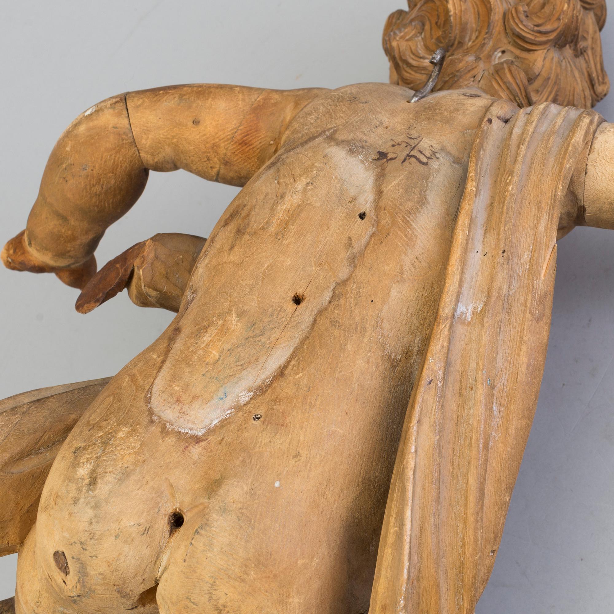 A 17th-/18th century wooden sculpture, probably Swedish.