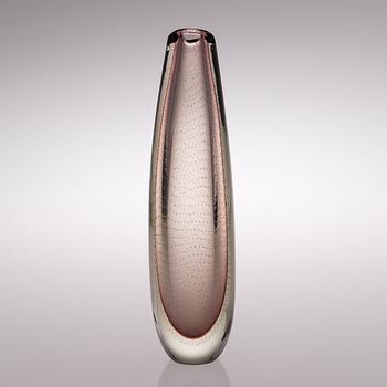 A glass vase signed G. Nyman.
