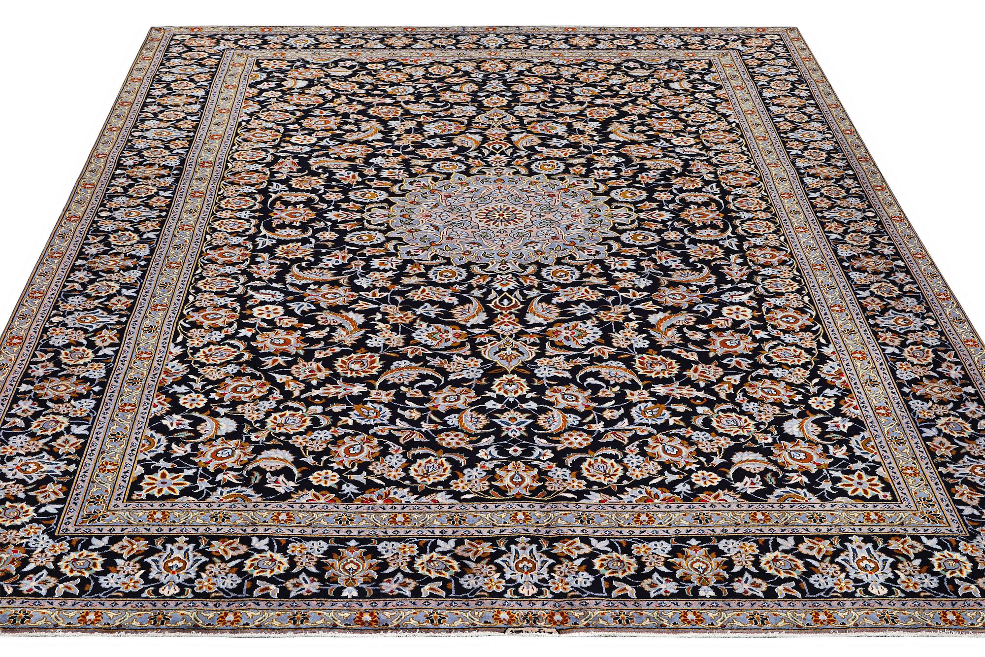 A Kashan carpet, c. 405 x 303 cm.