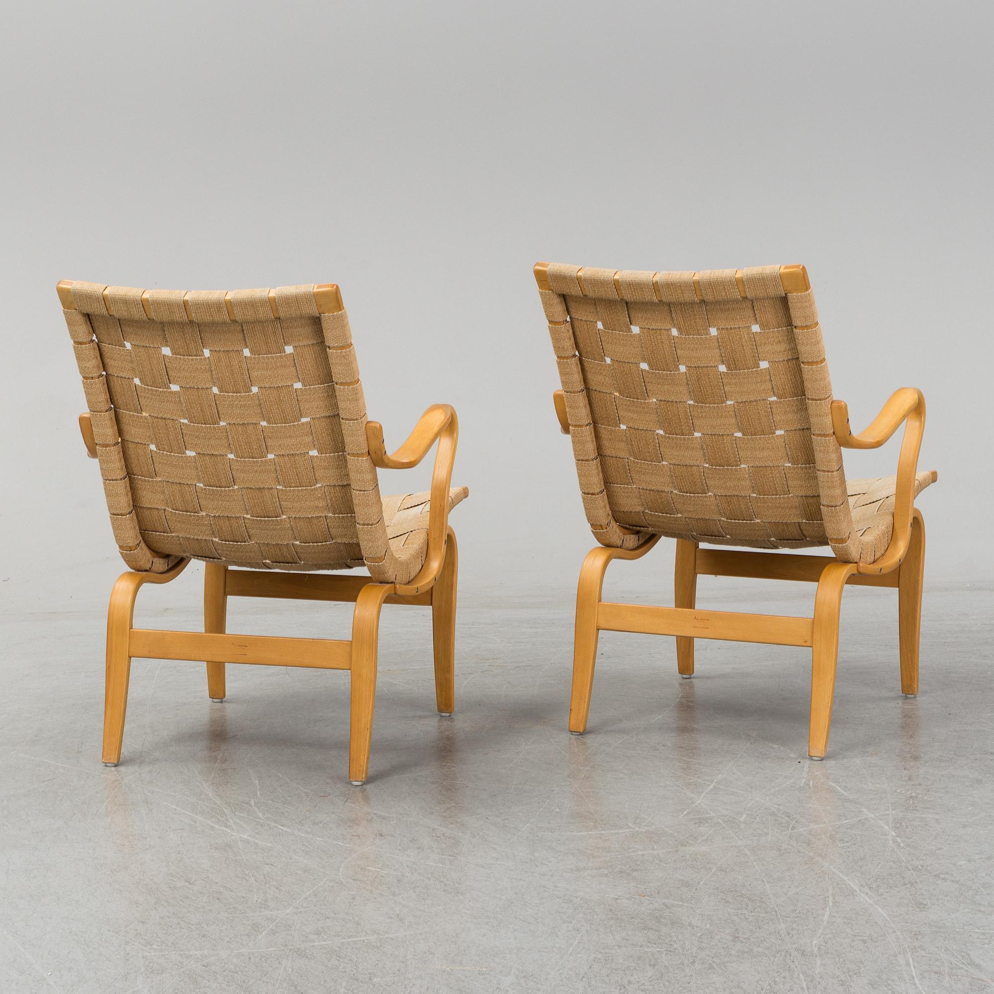 A pair of 'Eva' easy chairs by Bruno Mathsson, Firma Karl Mathsson, Värnamo 1973.