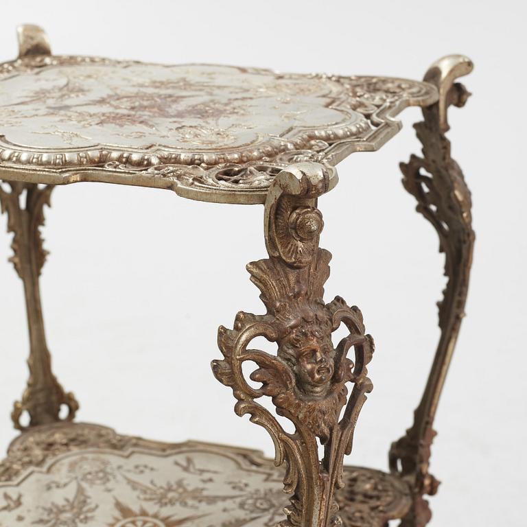 A three-tiered metal pedestal, first half of the 20th century.