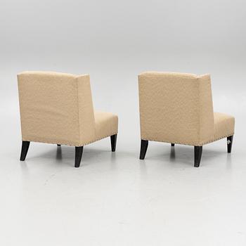 A pair of 'Triton custom chair' lounge chairs, Andrew & Martin, England, 21st century.
