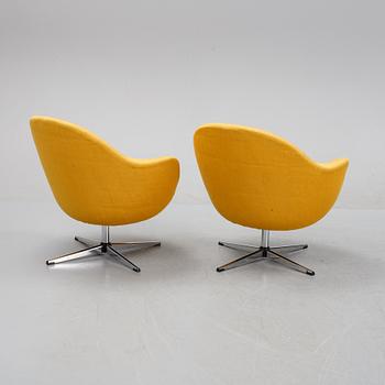 A pair of easy chairs, mid 20th Century.