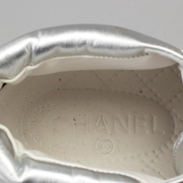 Sneakers by Chanel.