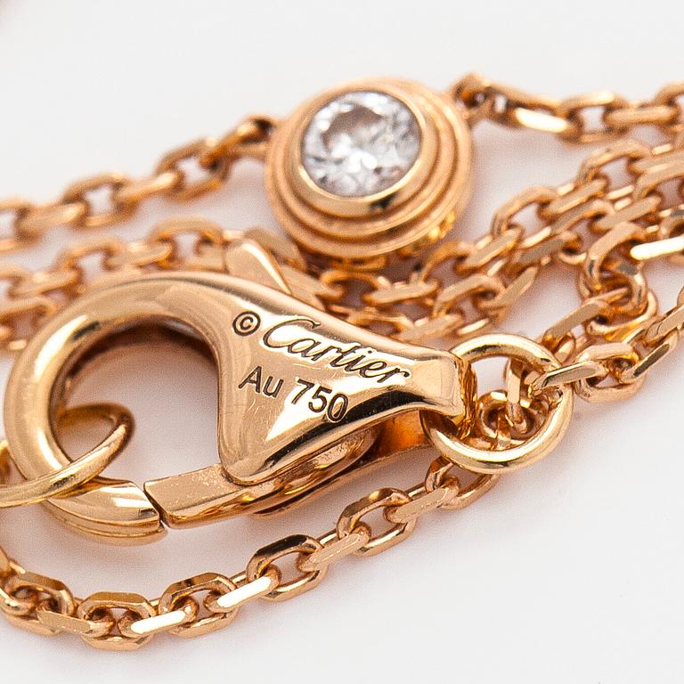 Cartier, an 18K gold 'd'Amour' necklace, with a brilliant-cut diamond.