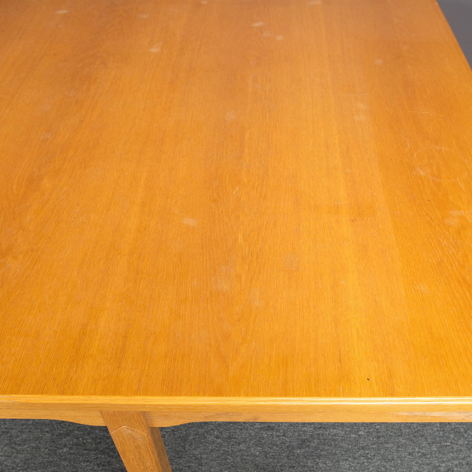 An oak conference table, probably by Carl Malmsten, mid 20th Century.