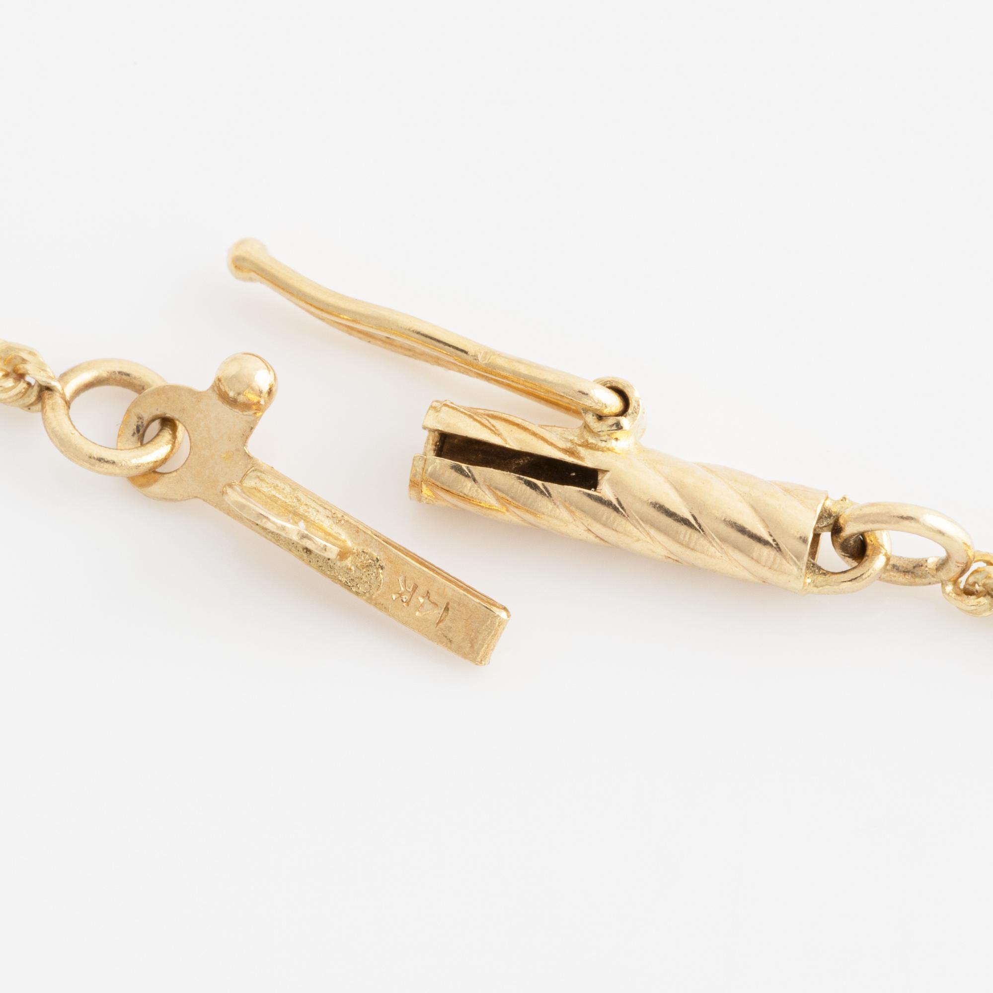 Collier, guld, hänge med smaragder och briljantslipade diamanter.