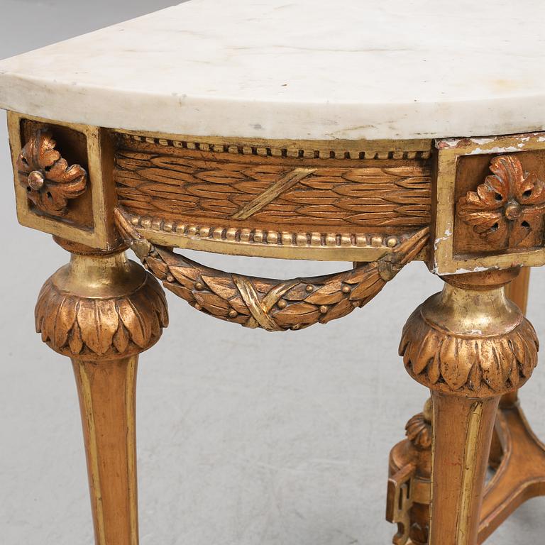 A Gustavian giltwood and marble console table, late 18th century.