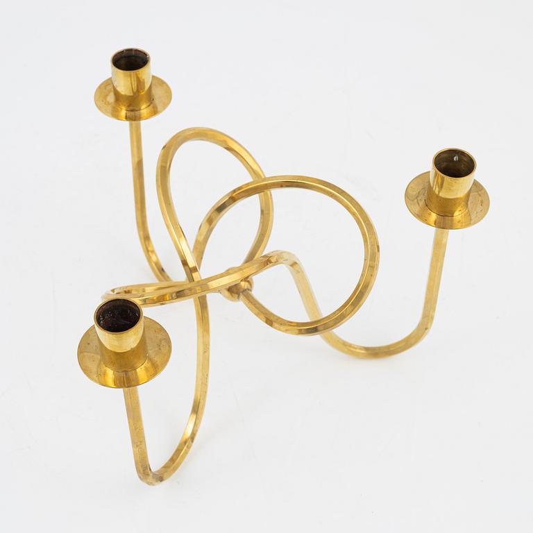 Josef Frank, a brass candelabrum, 'Vänskapsknuten', Svenskt Tenn.