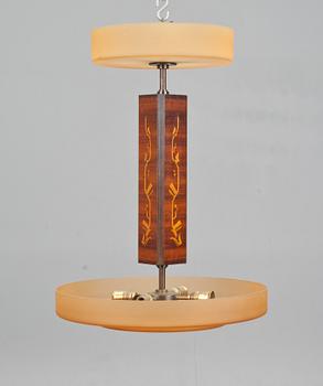 TAKLAMPA. Mjölby intarsia, 1900-tal.