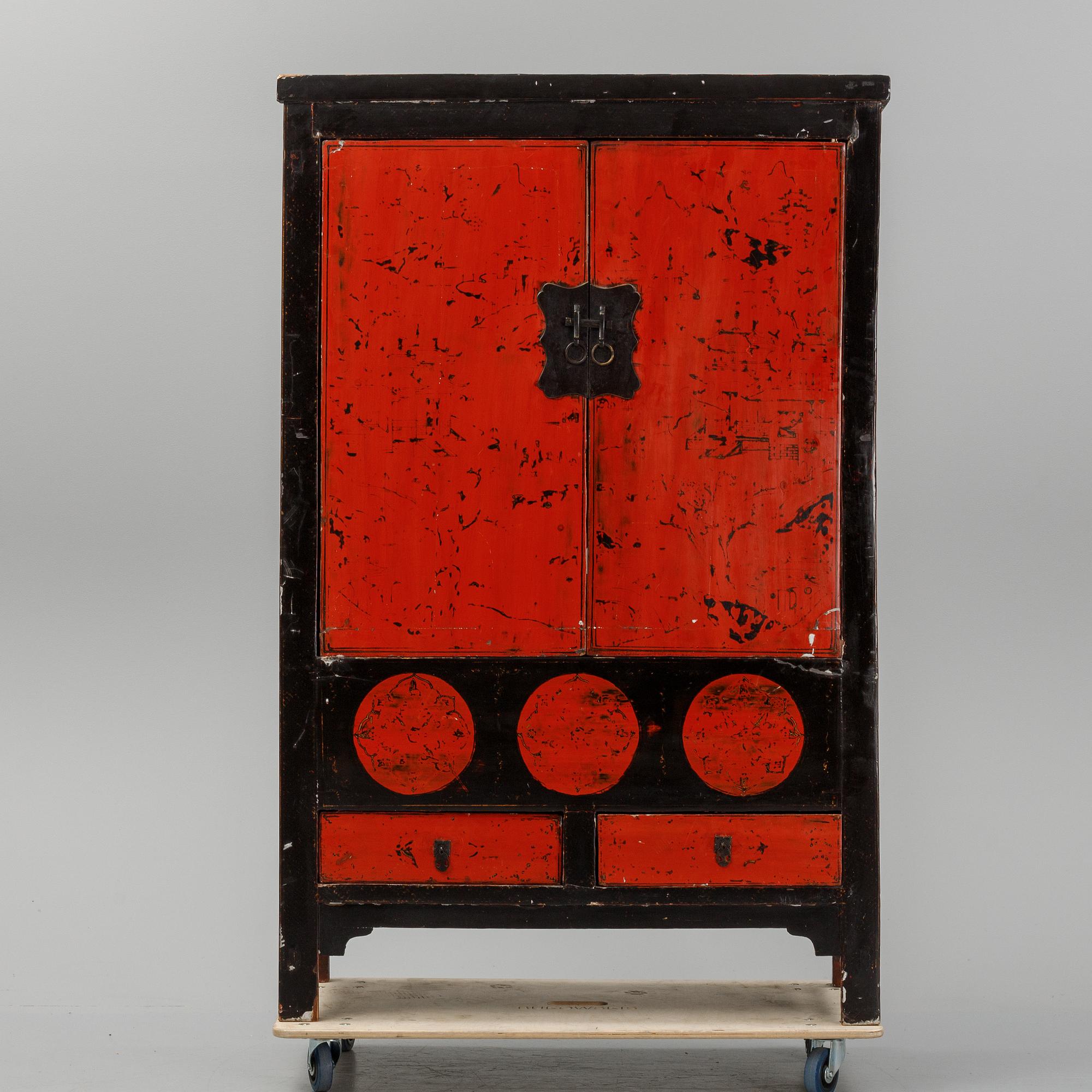 A Chinese lacquered cabinet, 20th century.