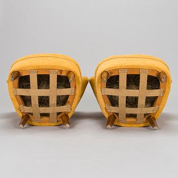 A pair of armchairs, mid-20th century.