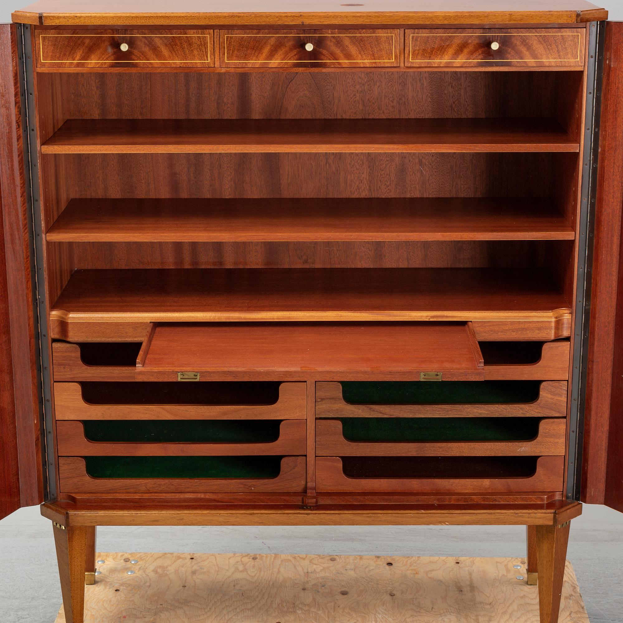 A mid 20th century mahogany veneered cabinet, Bodafors.