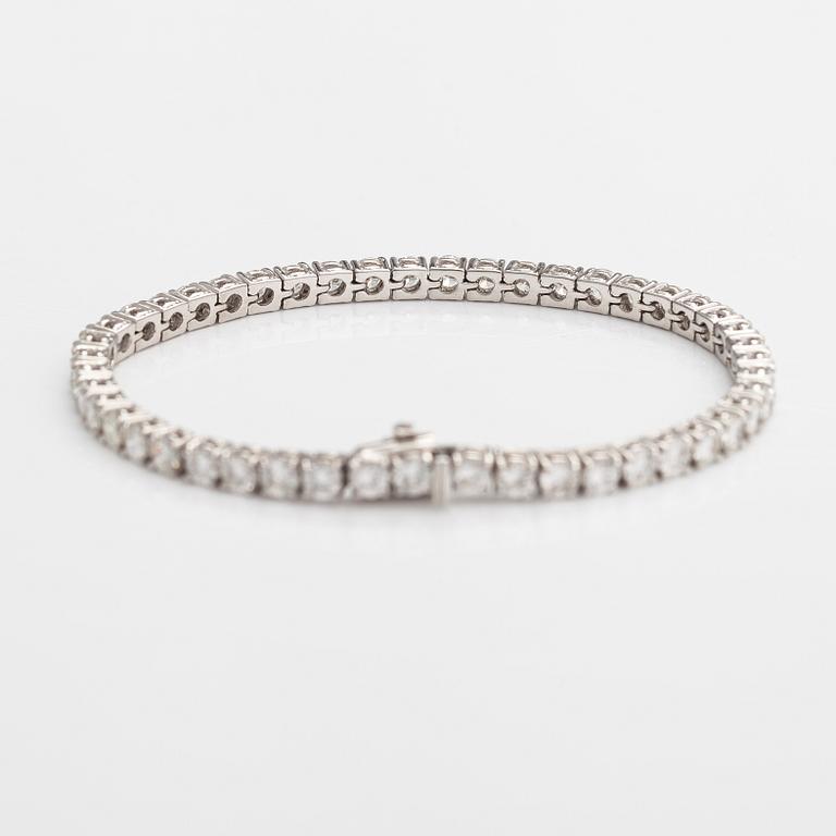 Tennisrannekoru, 18K valkokultaa, briljanttihiottuja timantteja n. 7.00 ct yht.