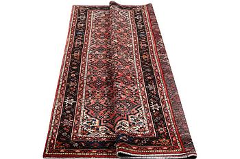 A carpet, Hosseinabad, c. 303 x 218 cm.