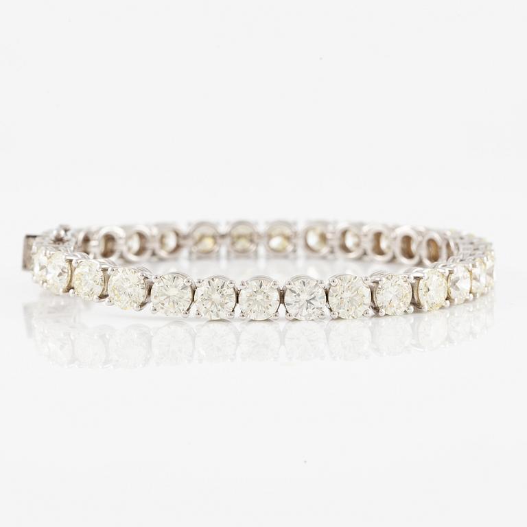 Tennis bracelet, 18K white gold with brilliant-cut diamonds.