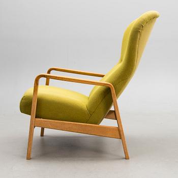 A 1960s 'Puck' armchair for Keravan Puusepäntehdas, Stockmann, Finland.
