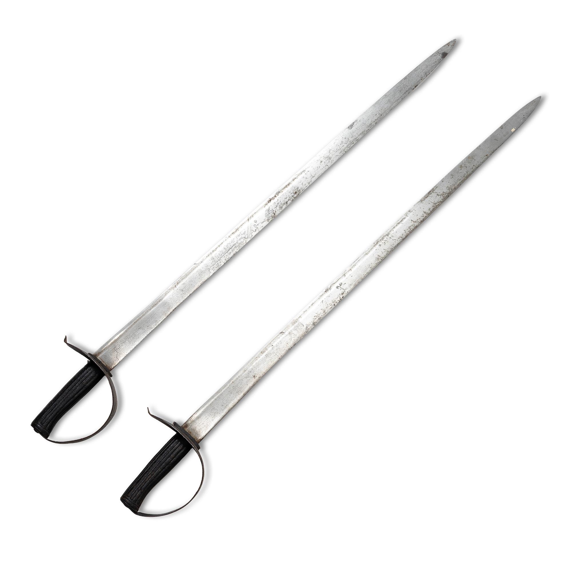 Two 19th century naval cutlasses.