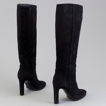 Black suede boots by Yves Saint Lurent.