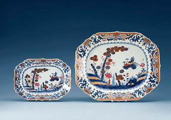 1433. A set of two 'clobbered' blue and white serving dishes, Qing dynasty, Qianlong (1736-95). (2).