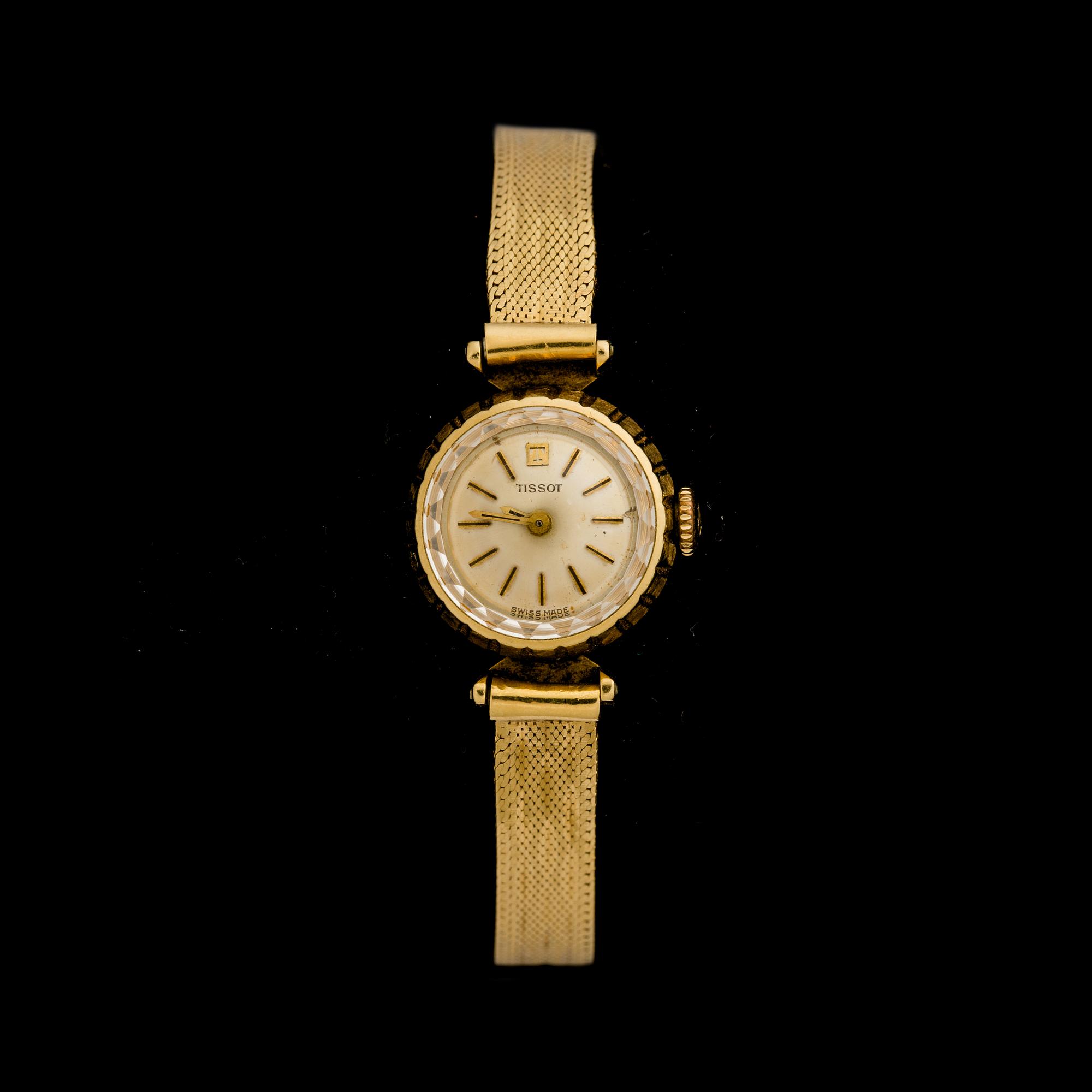 DAMARMBANDSUR, delvis 18K guld. Tissot. Vikt totalt ca 20 gram.