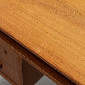 A 1960's teak writing desk.