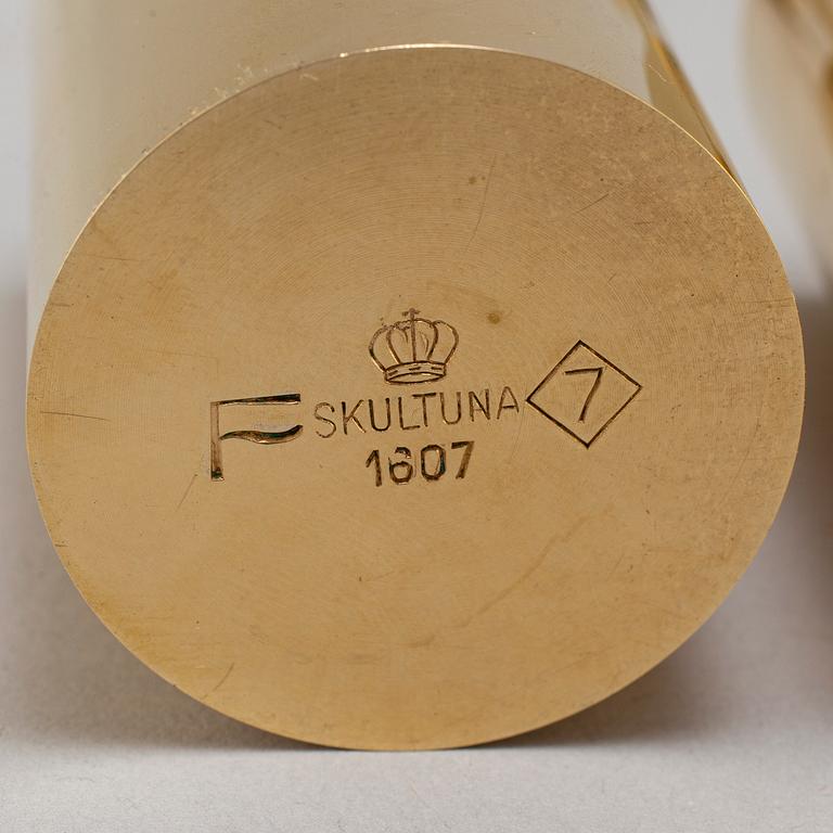 PIERRE FORSSELL, a pair of brass candlesticks, Skultuna.