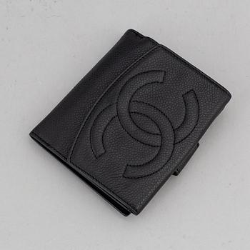 CHANEL, a caviar leather wallet.