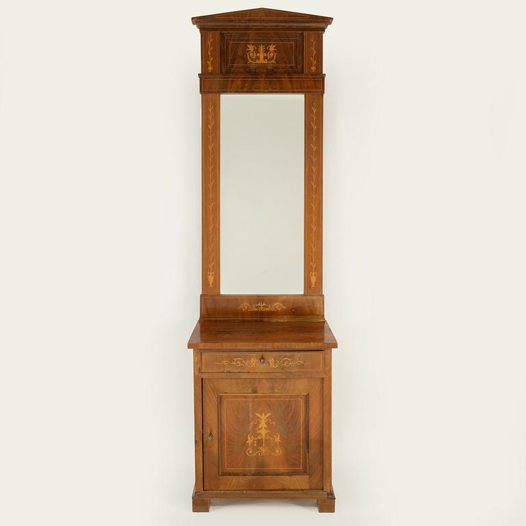 A mirror and cabinet from the mid 1800's.