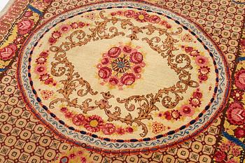 A semi-antique Tabriz carpet of Aubusson design. 246 x 171 cm.