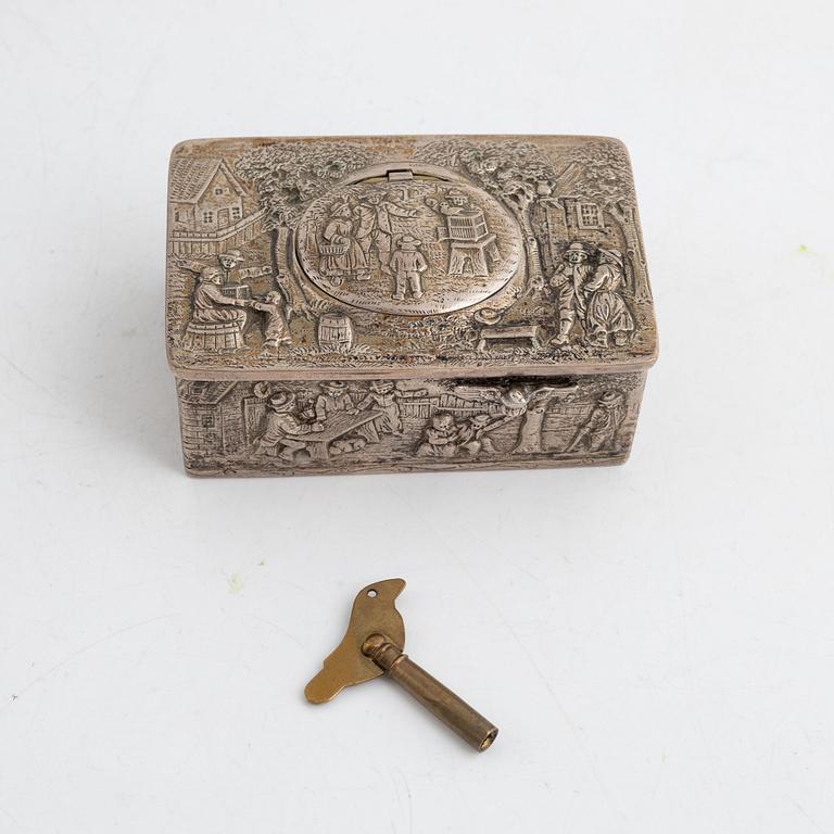 A German rococo style silver-plate music box, 19th century.