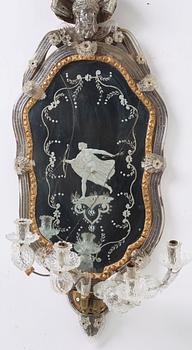 A pair of Venetian four-light girandole mirrors attributed to Briati family, circa 1730.