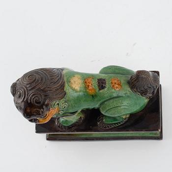A Chinese figure of a buddhist lion, Qing dynasty, 19th Century.