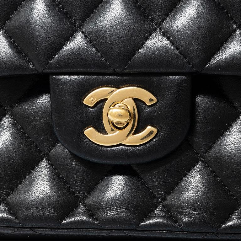 Chanel, A black leather 'Double Flap Bag Small'.