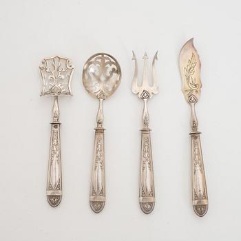 A set of four French silver serving cutlery.