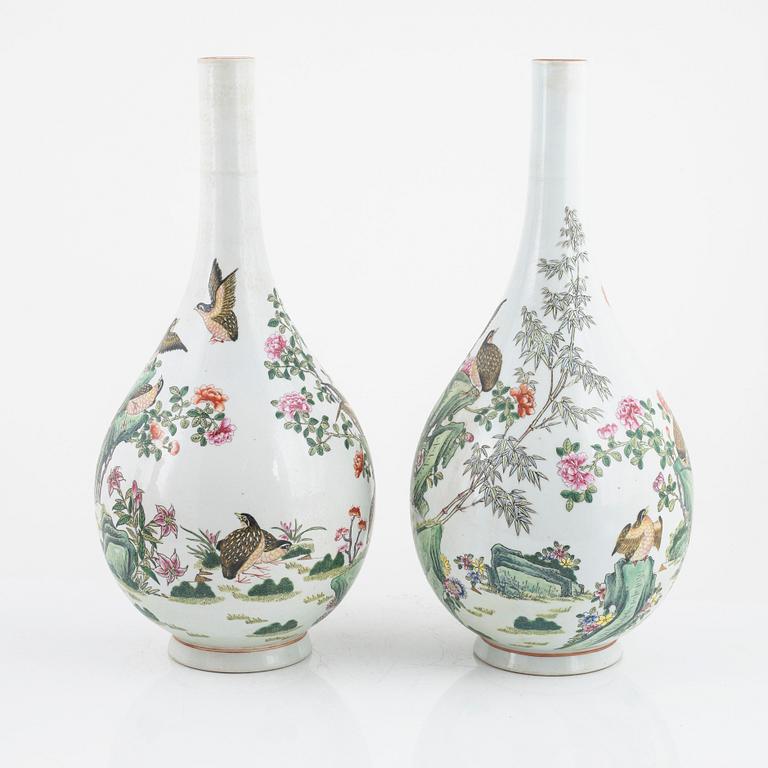 A pair of Chinese famille rose vases, 20th century.