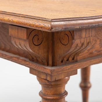 A dining table, late 19th Century.