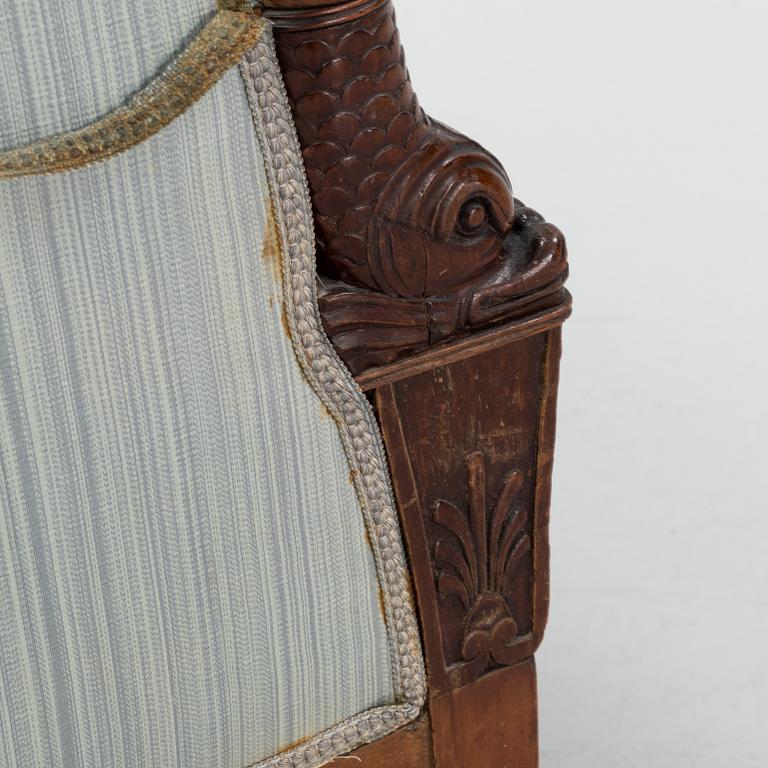 An Empire style mahogany easy chair, early 19th Century.