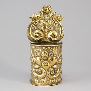 A 19th century brass spoon holder.