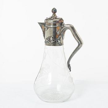A silver and glass Art Nouveau claret jug, David Andersen, Stockholm, 1901.