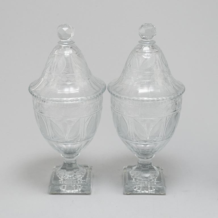 A pair of late 19th century lidded glass cups.