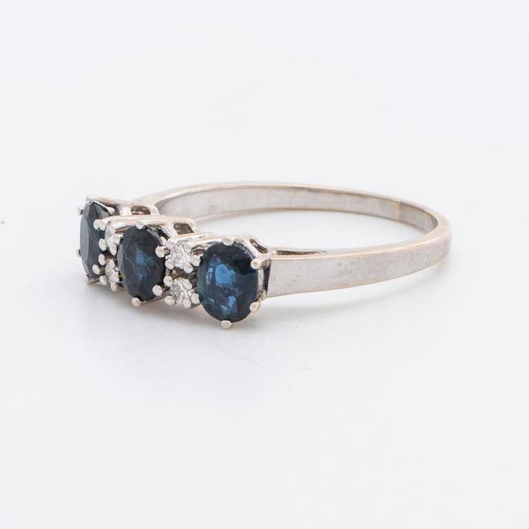 RING 18k whitegold w 3 sapphires 5 x 4 mm and 4 brilliant-cut Diamonds 0,12 ct in total engraved.