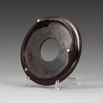 A bronze tripod censer with cover and stand, Qing dynasty, 17/18th Century.