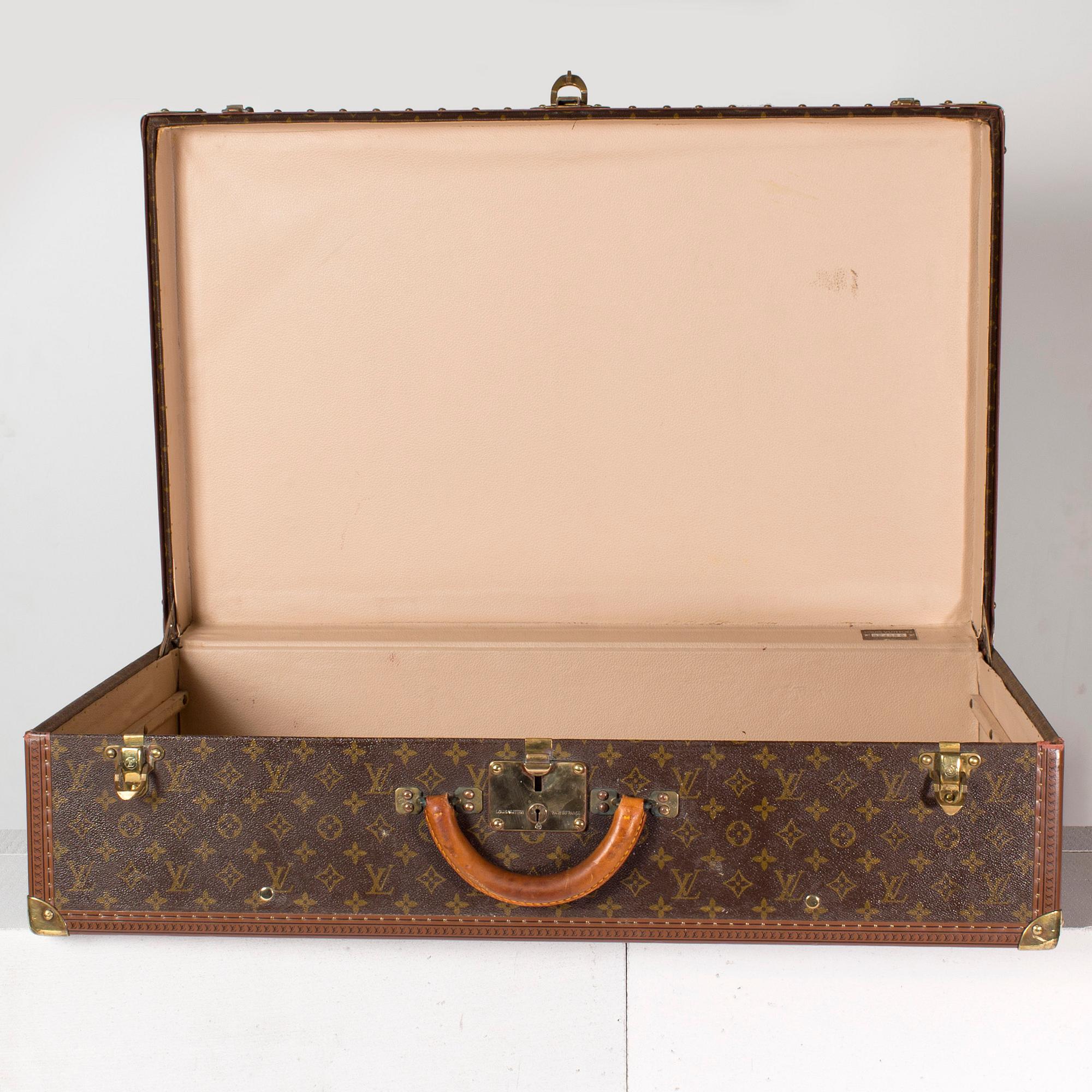 SUITCASE "Alzer 80" by Louis Vuitton.