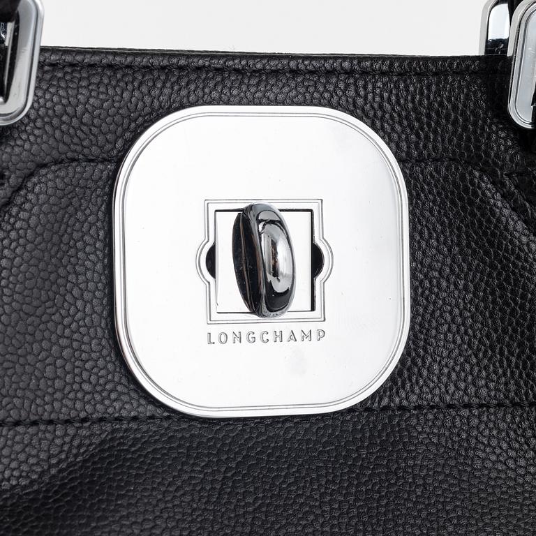 Longchamp, A black leather bag.