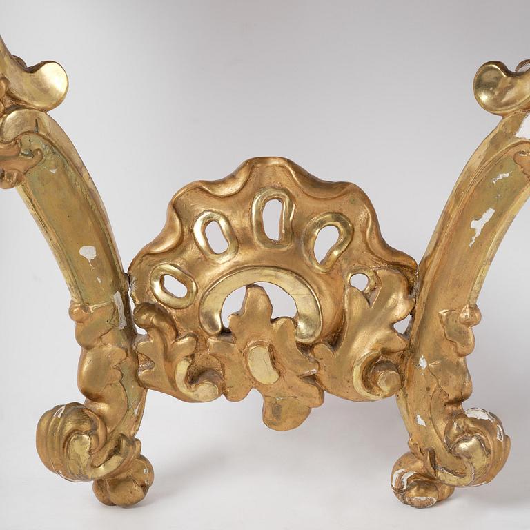 A rococo gilt-gesso and marble-top console table, Stockholm, later part 18th century.